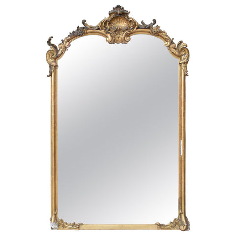 Antique Gilt Full-Length Mirror with Decorative Carvings and Shell Cartouche