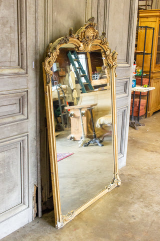 Antique Gilt Full-Length Mirror with Decorative Carvings and Shell Cartouche