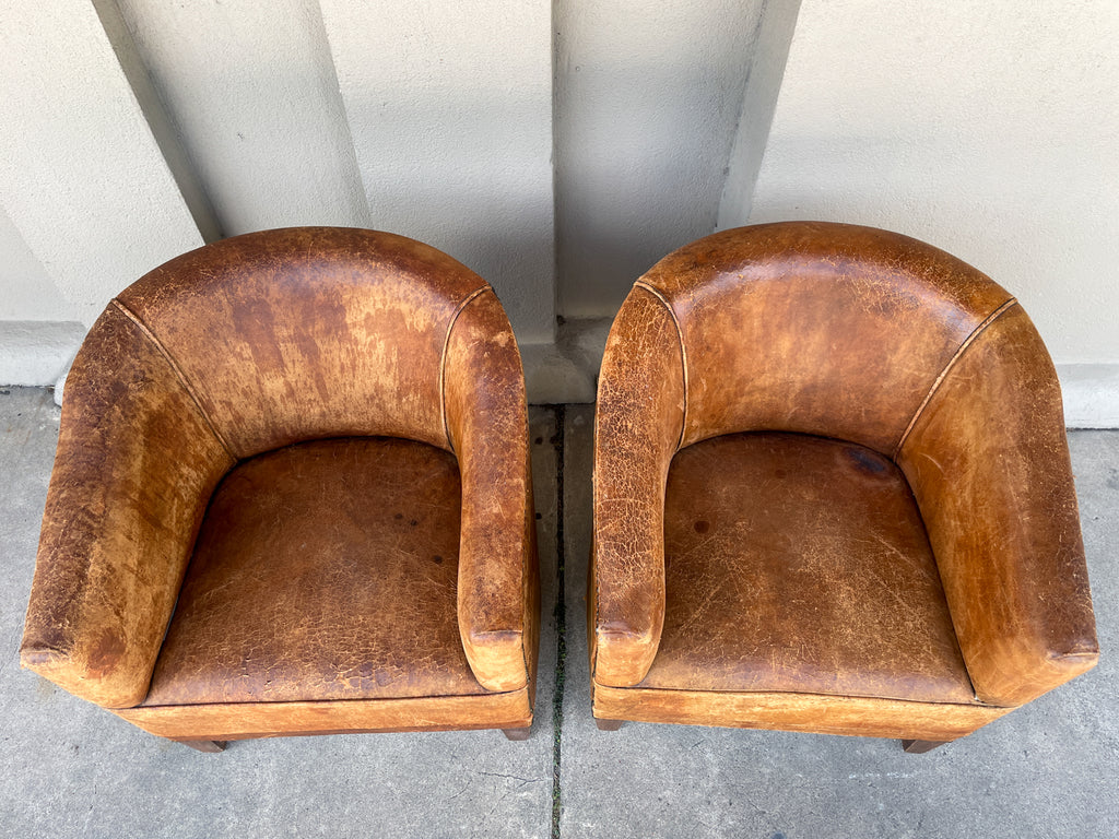 Pair Vintage European Leather Tub Chairs with Brass Nailhead Detail